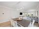 Open dining and living area featuring modern furnishings and ample natural light at 1623 8Th W Ave, Bradenton, FL 34205