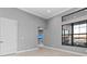Bonus room features a large window with view of the water and a connecting doorway at 1702 4Th St E E St, Palmetto, FL 34221