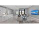Open concept living space features a seamless flow to the outdoors and modern decor with finishes at 1702 4Th St E E St, Palmetto, FL 34221