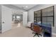 Bright office space featuring natural light, a desk, chair, neutral decor, and an open doorway at 1702 4Th St E E St, Palmetto, FL 34221