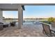 Inviting outdoor space with comfortable seating, a pool, and picturesque lake views at 1702 4Th St E E St, Palmetto, FL 34221