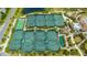 Aerial view showcases tennis, pool and clubhouse and golf course in a premier community at 17510 Gawthrop Dr # 305, Bradenton, FL 34211