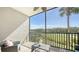 Relaxing screened balcony with peaceful view of the golf course and pond at 17510 Gawthrop Dr # 305, Bradenton, FL 34211