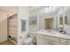 Full bathroom with a shower/tub, toilet, white vanity with a quartz countertop, and decorative accessories at 17510 Gawthrop Dr # 305, Bradenton, FL 34211