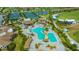 Aerial view of the community pool including a lazy river, lap pool, and lounge areas at 17510 Gawthrop Dr # 305, Bradenton, FL 34211