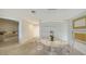 Bright dining area with marble table, stylish chairs, and contemporary lighting fixtures at 1800 Benjamin Franklin Dr # B308, Sarasota, FL 34236