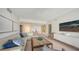 Comfortable living room and dining area with neutral tones, modern decor, and bright, airy feel at 1800 Benjamin Franklin Dr # B308, Sarasota, FL 34236