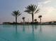 Stunning pool and ocean view creating a serene and luxurious atmosphere for relaxation and enjoyment at 1800 Benjamin Franklin Dr # B308, Sarasota, FL 34236