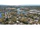 Stunning aerial view showcasing the neighborhood's canals, waterfront, and beautiful landscaping at 2213 Wason Rd, Sarasota, FL 34231