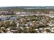 This aerial view of the neighborhood features tree-lined streets and waterway access at 2213 Wason Rd, Sarasota, FL 34231