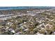 Aerial view showcases the neighborhood's mature trees, winding roads, and convenient amenities at 2213 Wason Rd, Sarasota, FL 34231