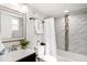 Stylish bathroom with a marble-tiled shower, modern fixtures, and ample natural light for a refreshing experience at 2213 Wason Rd, Sarasota, FL 34231
