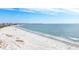 Expansive beachfront view with fine sand and clear water, ideal for a relaxing day at 2213 Wason Rd, Sarasota, FL 34231