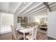 Open concept dining area leading into the living room and kitchen at 2213 Wason Rd, Sarasota, FL 34231
