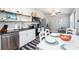 Modern kitchen with stainless steel appliances and a dining area at 2213 Wason Rd, Sarasota, FL 34231