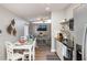 Efficient kitchen with a breakfast nook and access to the living room at 2213 Wason Rd, Sarasota, FL 34231