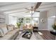 Inviting living room with vaulted ceilings, warm natural light, and stylish furniture at 2213 Wason Rd, Sarasota, FL 34231