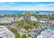 Aerial view of a vibrant town with lush greenery, and beautiful waterfront at 2213 Wason Rd, Sarasota, FL 34231