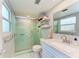 Bathroom featuring a shower, ample storage, and a pristine vanity at 2233 Beneva Ter # 2232, Sarasota, FL 34232