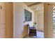 Inviting entryway featuring a cozy chair and view of a window with blinds at 2233 Beneva Ter # 2232, Sarasota, FL 34232