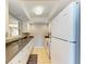 Efficient kitchen design with white cabinets, ample counter space, and modern appliances at 2233 Beneva Ter # 2232, Sarasota, FL 34232
