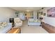 A well-lit living room featuring comfortable seating and a calming color scheme at 2233 Beneva Ter # 2232, Sarasota, FL 34232