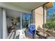 Screened in patio with lake views and comfortable seating at 2233 Beneva Ter # 2232, Sarasota, FL 34232