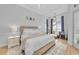 Comfortable bedroom with a neutral color palette, sitting area, and stylish furnishings at 22354 Panther Loop, Bradenton, FL 34202