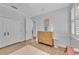 Bedroom with two closets, natural light, and wood floors at 22354 Panther Loop, Bradenton, FL 34202