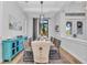 Elegant dining room showcasing a wood table, stylish seating, and an artful decor at 22354 Panther Loop, Bradenton, FL 34202