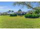 Inviting home with a well-manicured lawn and lush landscaping creating a picturesque curb appeal at 22354 Panther Loop, Bradenton, FL 34202