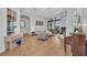Spacious living room with hardwood floors, fireplace, stylish furnishings, and natural light at 22354 Panther Loop, Bradenton, FL 34202