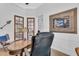 Office features shiplap walls, wood floors, and French doors at 22354 Panther Loop, Bradenton, FL 34202