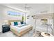 Bright, spacious bedroom with a mix of sleeping arrangements and a large window at 2327 Hillview St, Sarasota, FL 34239