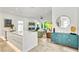 Bright, open-concept living space with a fireplace and stylish modern decor at 2327 Hillview St, Sarasota, FL 34239