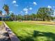 Enjoyable bocce ball court with lush green turf, perfect for outdoor recreation at 2334 Felicity Pl, North Port, FL 34289