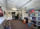 Functional garage with shelving, bike storage, and ample room for various household items at 2334 Felicity Pl, North Port, FL 34289