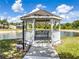 Scenic gazebo overlooking the water, offering a tranquil retreat within the community at 2334 Felicity Pl, North Port, FL 34289