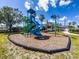 Aerial view of playground with a slide, stairs, ladder, palm tree and a green light post at 2334 Felicity Pl, North Port, FL 34289