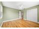 Bedroom with hardwood floors, natural light, and neutral wall color at 2361 Rose St, Sarasota, FL 34239