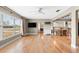 Bright living room with large windows and hardwood floors, ready for relaxation and entertainment at 2361 Rose St, Sarasota, FL 34239
