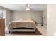 Cozy main bedroom featuring a comfortable bed, neutral decor, and soft natural lighting at 2361 Rose St, Sarasota, FL 34239