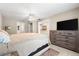 Well-lit main bedroom offering walk-in closet and kitchen views, with modern amenities and soothing palette at 2361 Rose St, Sarasota, FL 34239