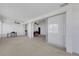 Bonus room featuring an open floor plan and bright light at 3140 Village Green Dr # 1119, Sarasota, FL 34239