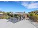 Outdoor patio area with seating and partial enclosure, perfect for entertaining at 3140 Village Green Dr # 1119, Sarasota, FL 34239