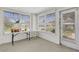 Sun room featuring multiple windows and bright light at 3140 Village Green Dr # 1119, Sarasota, FL 34239