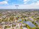 Beautiful aerial view of a neighborhood featuring a nearby pond and easy access to beaches at 3611 22Nd W Ave, Bradenton, FL 34205