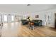 Spacious open-concept living area with hardwood floors, and a dining area for gatherings at 3611 22Nd W Ave, Bradenton, FL 34205