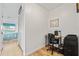 Office nook featuring wood floors, work space, and closet with access to bedroom at 3611 22Nd W Ave, Bradenton, FL 34205