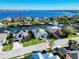 Waterfront home boasts lush landscaping, a private dock, and stunning views of the tranquil canal and bay at 3707 5Th Ne Ave, Bradenton, FL 34208